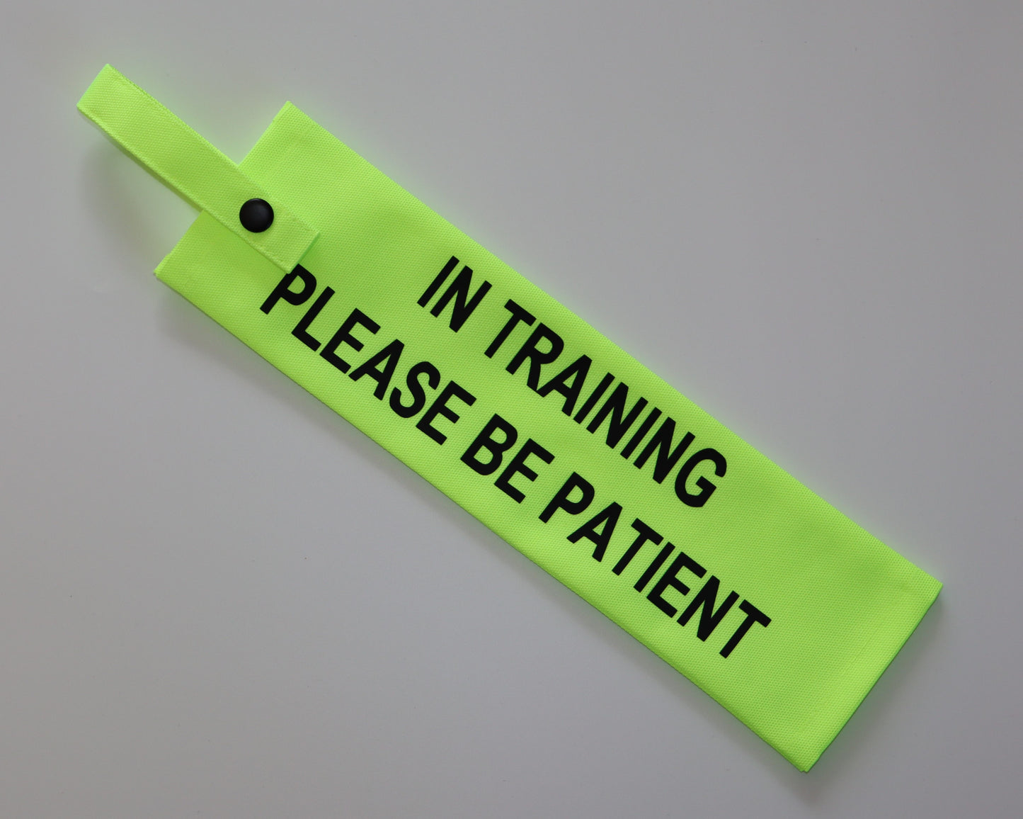 In Training Please Be Patient Fluorescent Dog Lead Sleeve