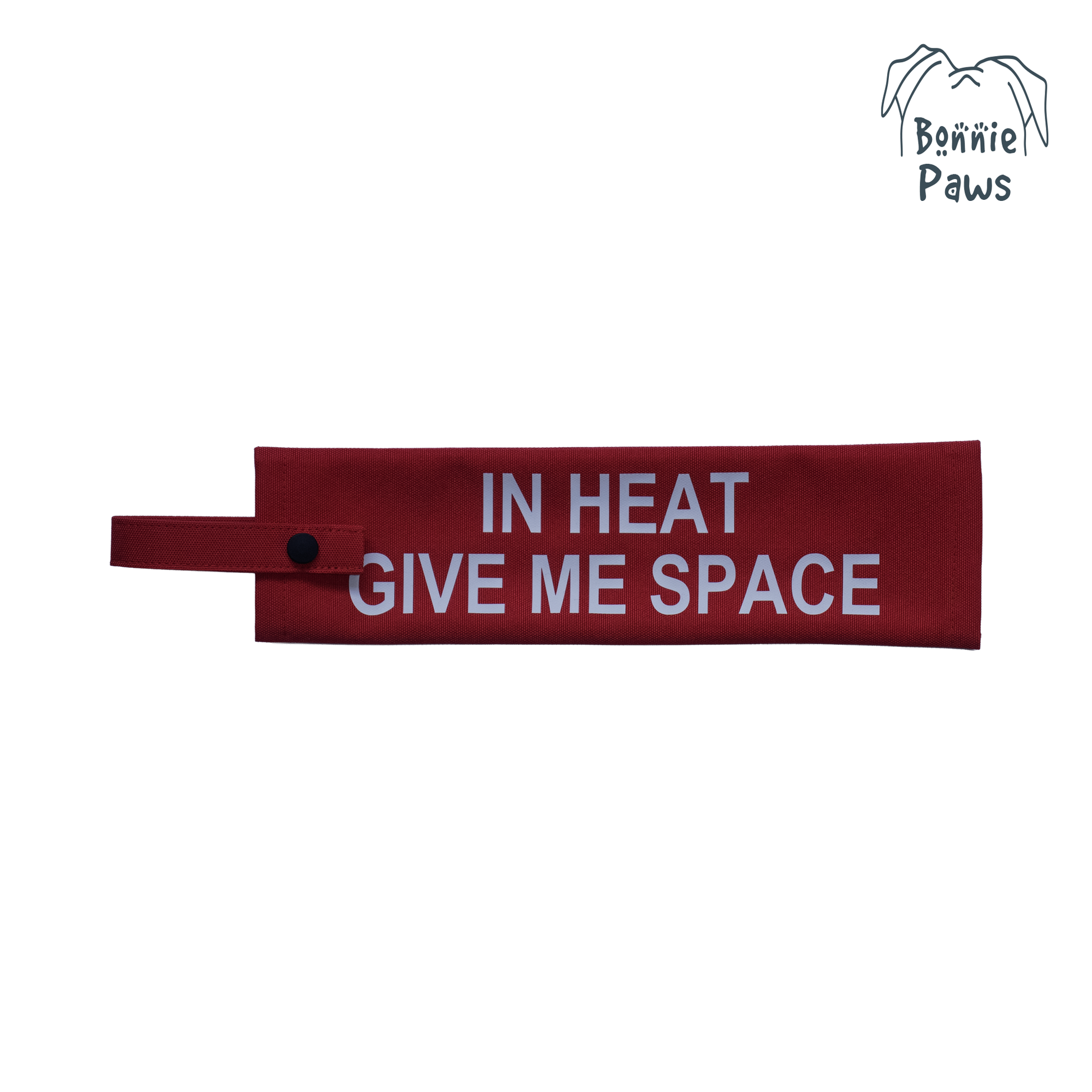 Flat lay view of a red waterproof dog warning sleeve with bold white GIVE ME SPACE lettering.
