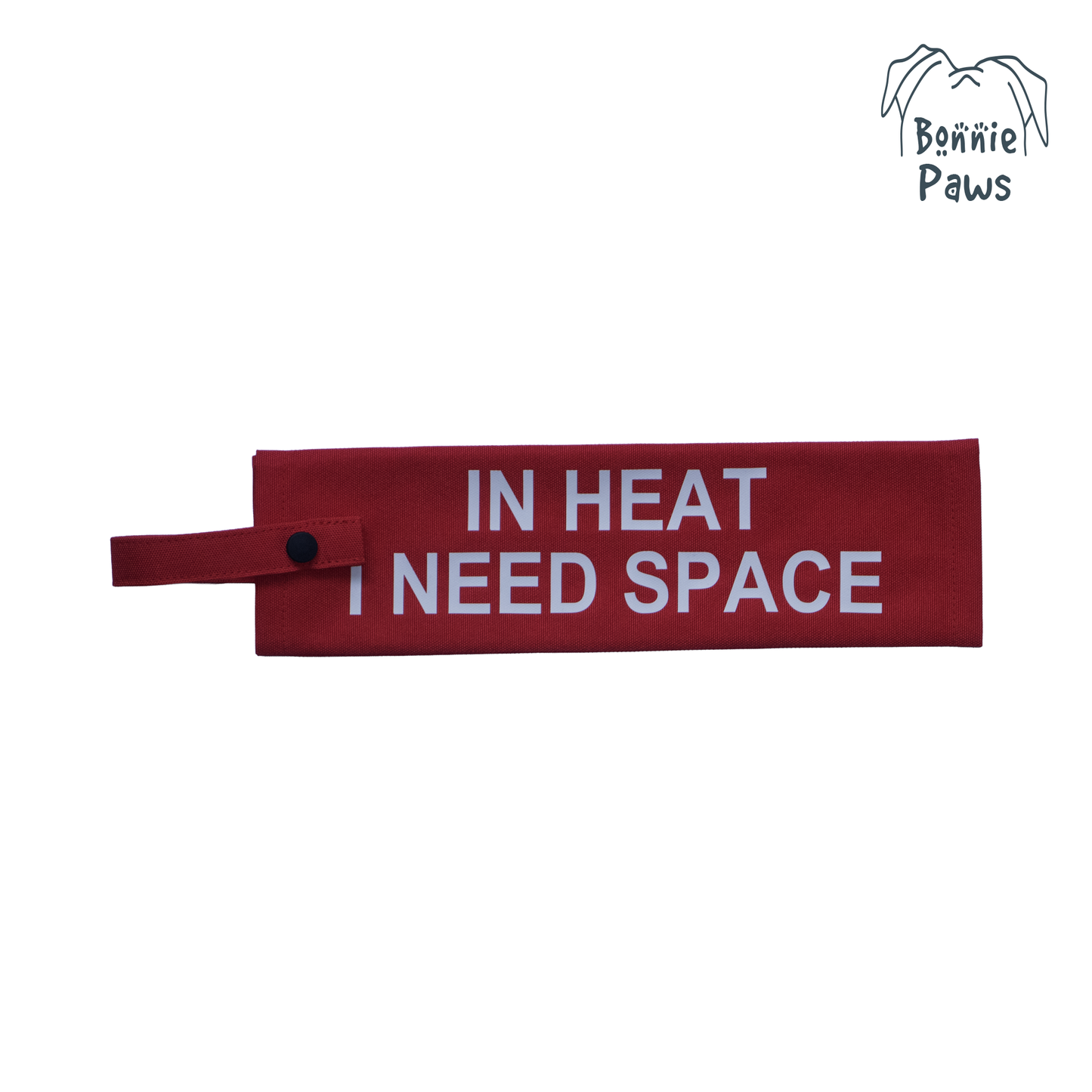 Flat lay view of a red waterproof dog warning sleeve with bold white GIVE ME SPACE lettering.