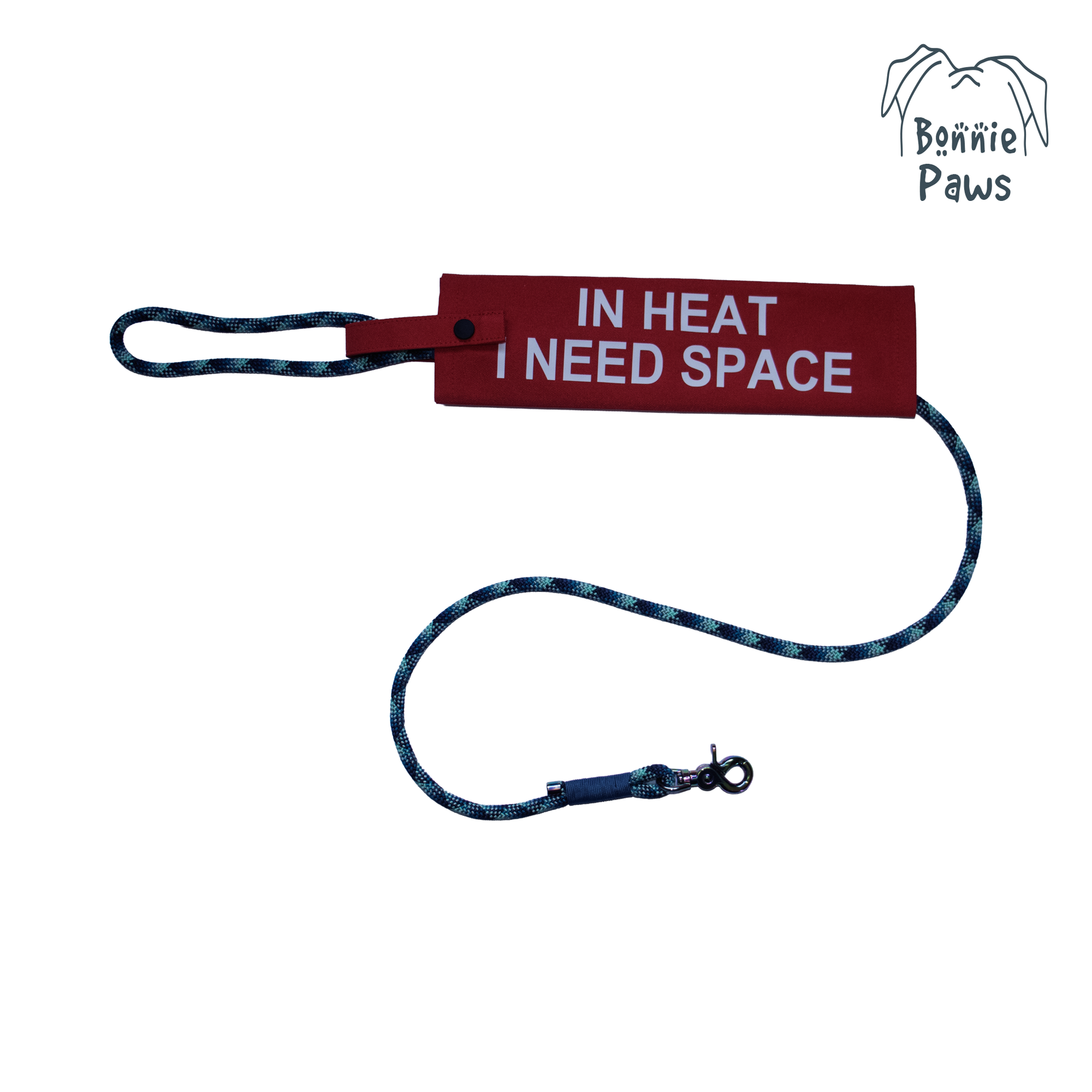 "In Heat" dog lead sleeve with "I NEED SPACE" text and Bonnie Paws logo on a lead.