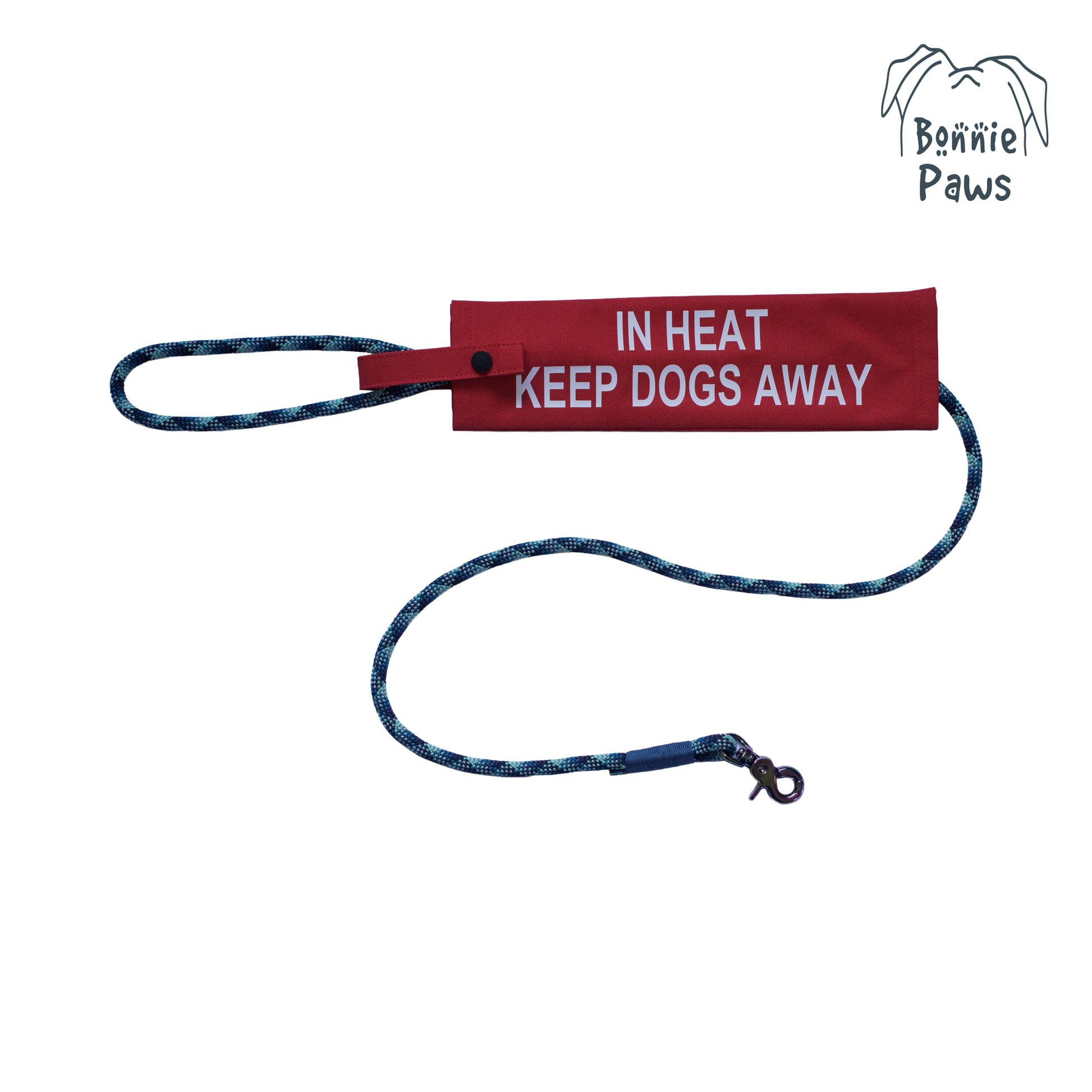 Red "In Heat" dog lead sleeve with "KEEP DOGS AWAY" text and Bonnie Paws logo on a lead.